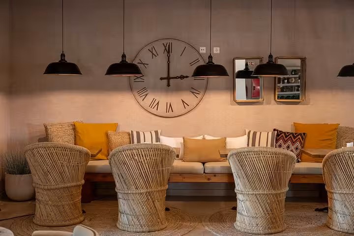 Relax in a cozy, stylish lounge setting in Comporta, perfect for unwinding on the Private Wine Tour from Lisbon.