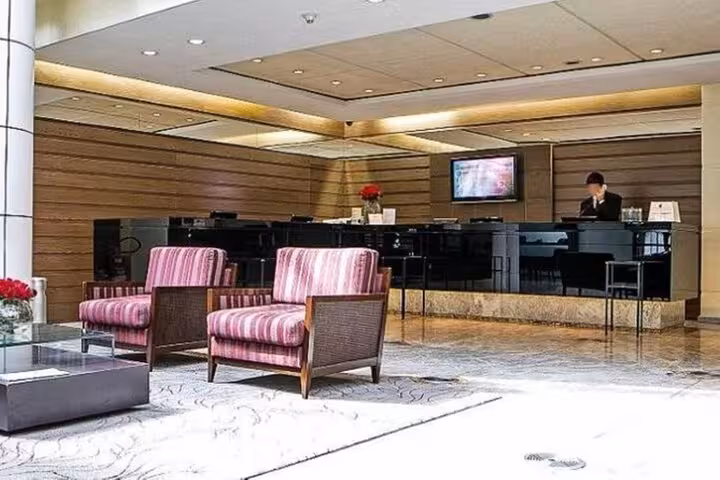 Luxurious hotel lobby in São Paulo ready for guests arriving via Congonhas Airport private transfer.