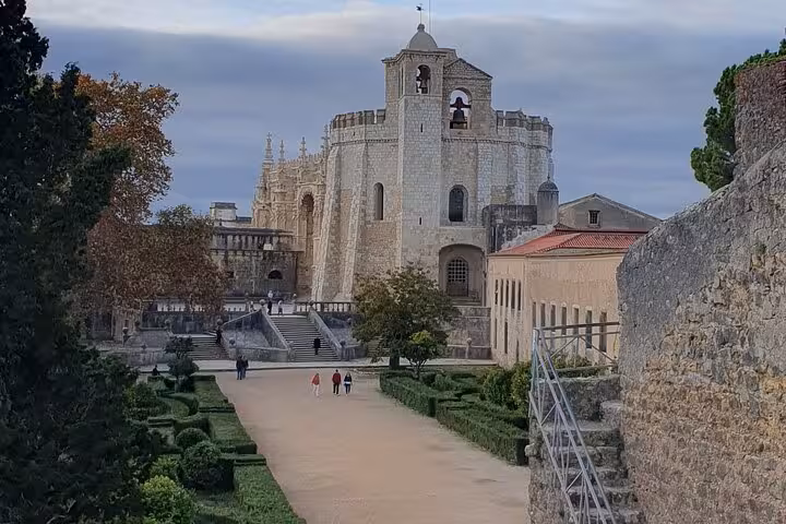 The iconic Convent of Christ in Tomar with its impressive architecture and manicured gardens.