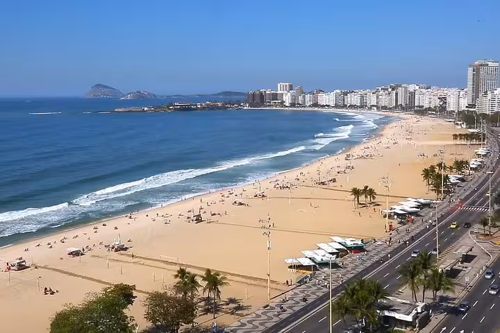 Scenic view of Copacabana Beach in Rio de Janeiro, perfect for travelers heading to Paraty with shared transfers.