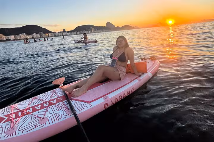 Join a Copacabana sunrise SUP tour, capturing breathtaking ocean views and vibrant sunlit horizons.