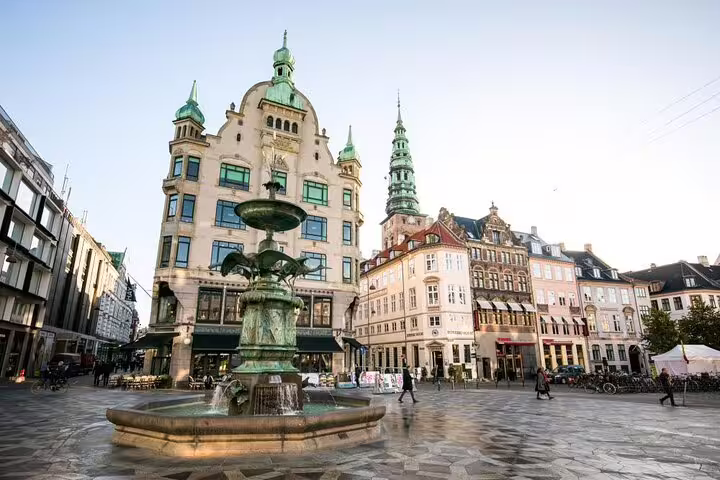 Copenhagen city square with fountain and historic buildings, landmark stop on a self-guided scavenger hunt