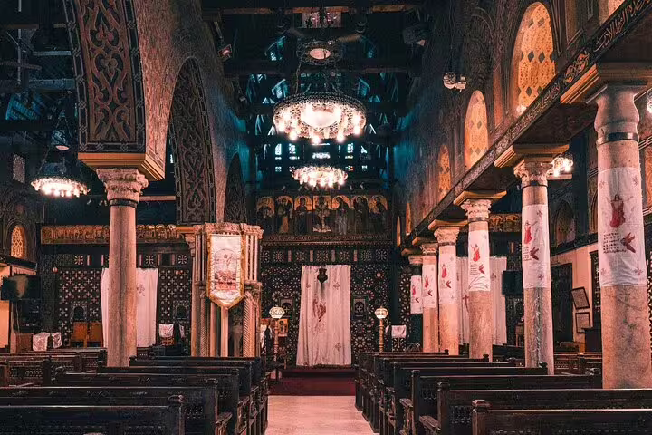 Historic Coptic Cairo church interior with chandeliers, part of a private 2-day Cairo guided tour