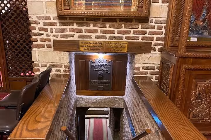 Historic crypt stairway inside Old Cairo church, a Coptic Cairo hidden gems culture stop on the tour