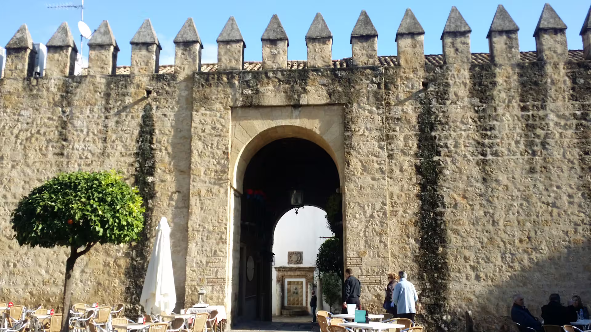 Medieval city gate and walls in Cordoba old town, Spain, visited on a private Costa del Sol to Cordoba day trip