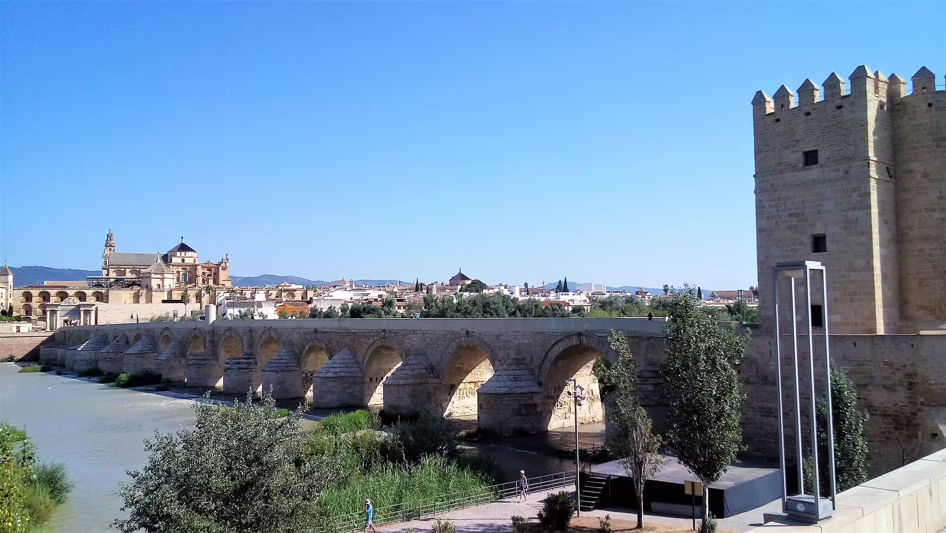 Roman Bridge and Calahorra Tower in Cordoba on a group day trip from Costa del Sol with pickup included