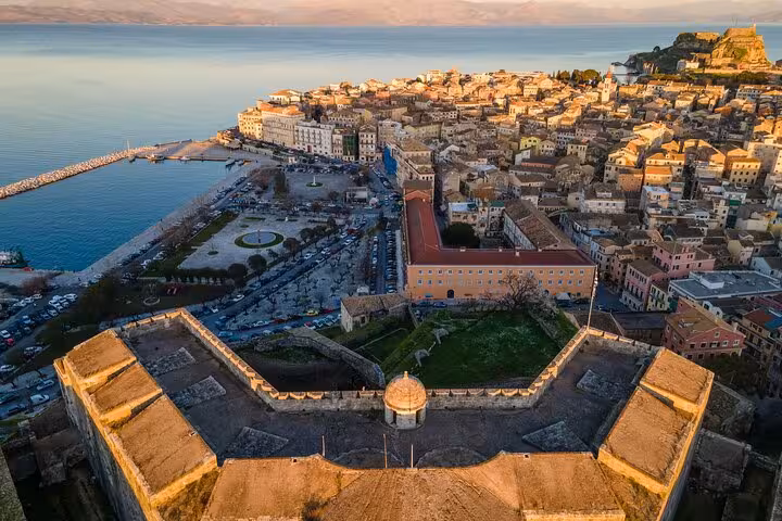 Old Fortress viewpoint over Corfu Town harbor at sunset, must-see on Best of Corfu private tour