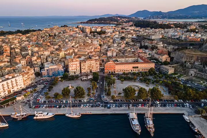 Aerial panorama of Old Corfu Town waterfront marina and Spianada Square, ideal for a private walking tour