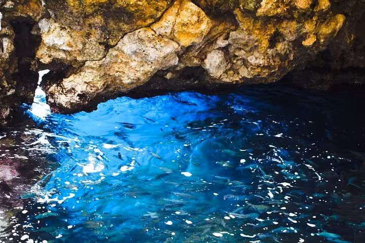 Turquoise sea cave waters in Corfu, Greece, a highlight stop on the Best of Corfu private day tour