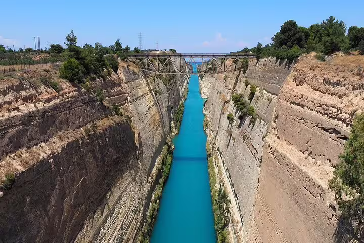 Discover the breathtaking Corinth Canal with its turquoise waters, a highlight of the 4-day Athens classical tour.
