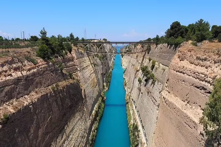 Daytime view of the Corinth Canal gorge from the bridge, a highlight of the Athens half-day Corinth tour