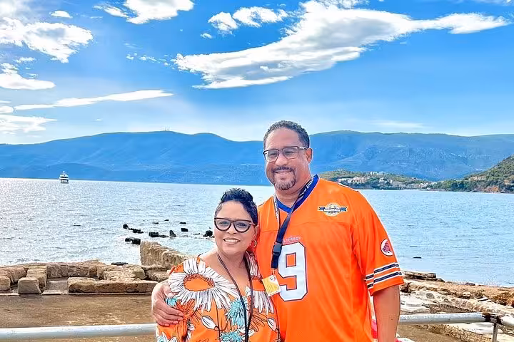 Couple by the Corinthian Gulf on St Paul’s Footsteps biblical tour, Letters to the Corinthians 6-hour trip