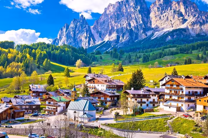 Discover the picturesque village of Cortina d'Ampezzo nestled in the Dolomites, ideal for a transfer to Venice.