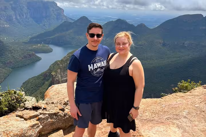 Couple enjoying stunning Blyde River Canyon views on a Panorama Guided Experience in Mpumalanga, South Africa.
