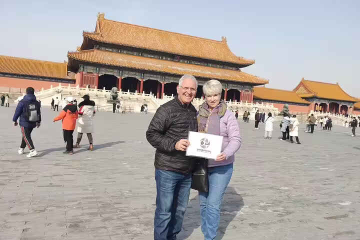 Couple exploring the Forbidden City in Beijing on the 14 Days Private Best China and Yangtze River Cruise Tour.