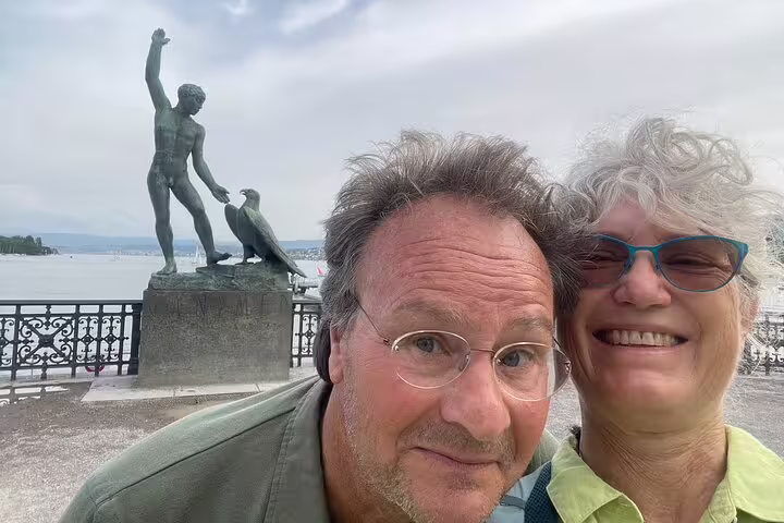 Couple selfie near the Ganymede statue on Lake Zurich, exploring a self-guided Zurich scavenger hunt tour