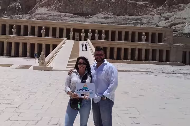Couple photo at Hatshepsut Temple, Deir el-Bahari, during a Luxor West Bank day tour in Egypt