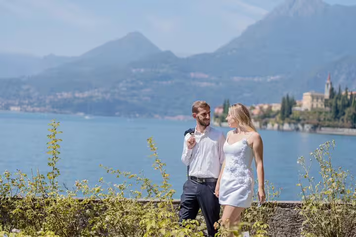 Couple walking by Lake Como with Bellagio views, captured on a private tour with personal photographer