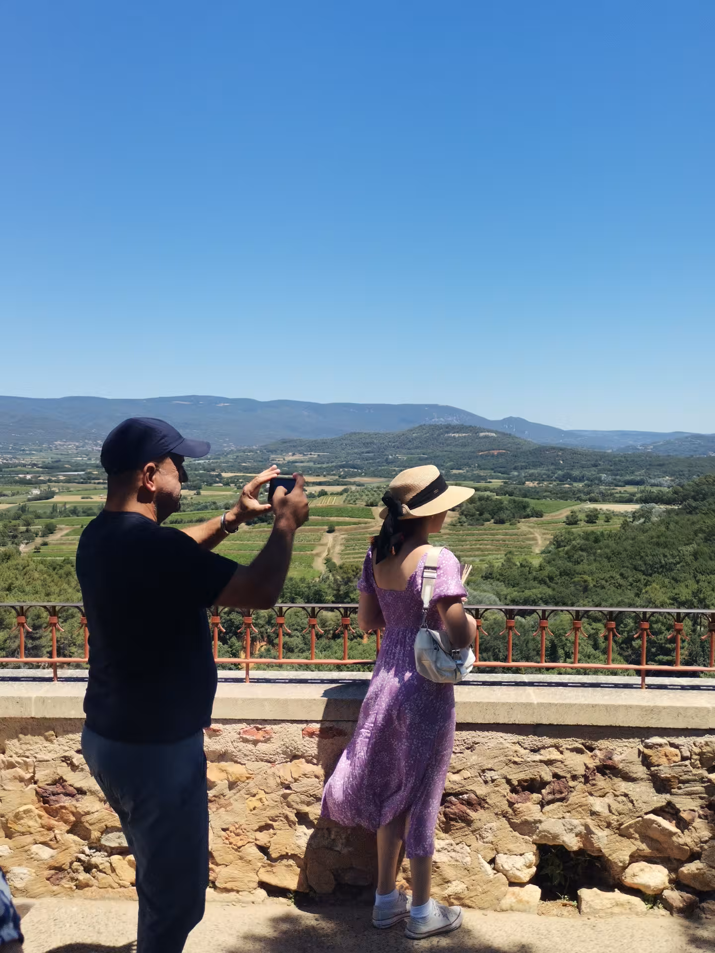 Couple enjoying panoramic Luberon valley view on a Provençal Picnic Tour in Provence, France