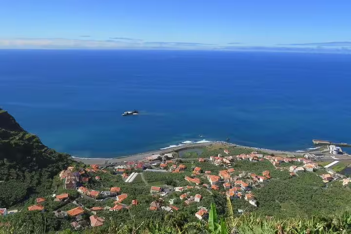 Scenic coastal view from Craters of Fire 4x4 Full-Day Tour, showcasing lush landscapes and vibrant ocean, perfect for adventure seekers.