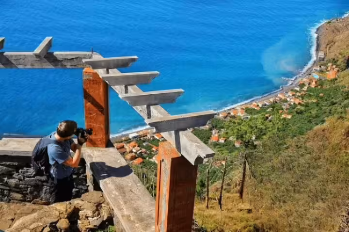 Photographer captures stunning coastal view on Craters of Fire 4X4 Full-Day Tour, showcasing Portugal's scenic landscapes.
