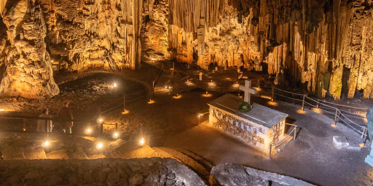 Guided visit to a sacred Cretan cave chapel with stalactites, part of the Crete history and culture tour
