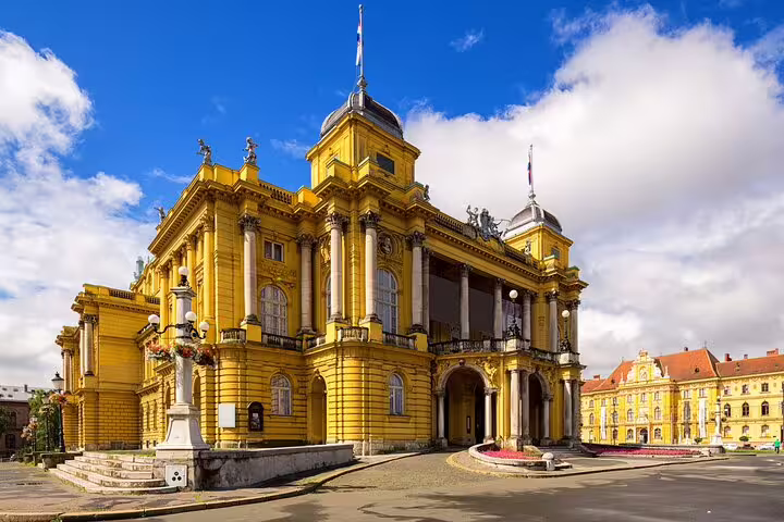 Croatian National Theatre in Zagreb under blue sky, key landmark on a self-guided scavenger hunt tour