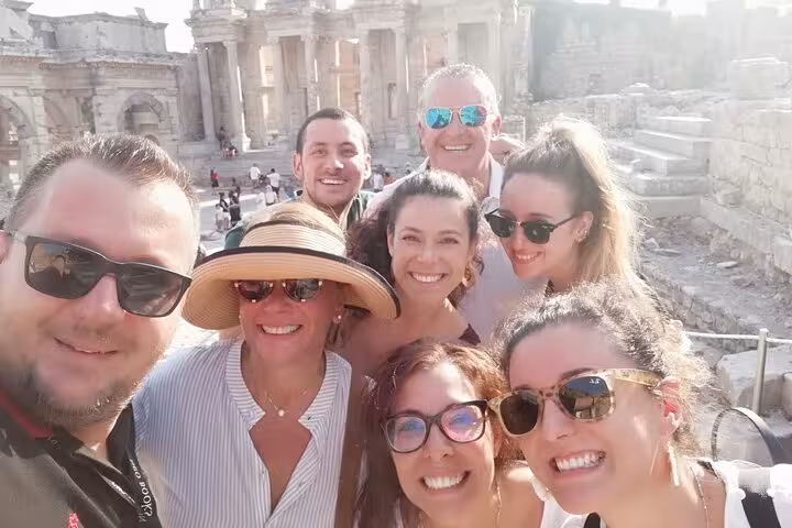 Happy cruise passengers selfie at Ephesus ruins on a private Ephesus and Sirince Village tour from Kusadasi