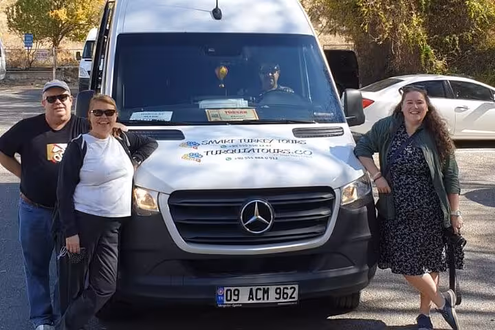 Cruise passengers meet private driver by tour van for skip-the-line half-day Ephesus shore excursion
