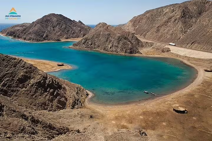Turquoise Red Sea lagoon near Dahab, scenic stop on private overnight Moses Mountain and St Catherine tour
