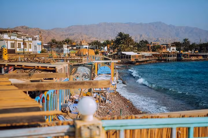 Colorful Dahab waterfront promenade and beach cafes on the Red Sea, stop on Jeep Safari Canyon Salama trip