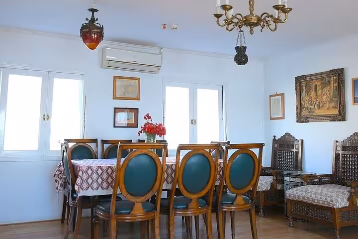 Elegant indoor dining salon on Dahabiya Nile cruise boat, 5 days Luxor to Aswan itinerary