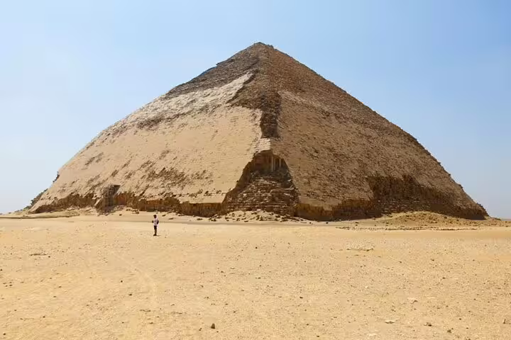 Wide view of Dahshur Bent Pyramid in Egypt desert, highlight of Memphis City tour from Cairo