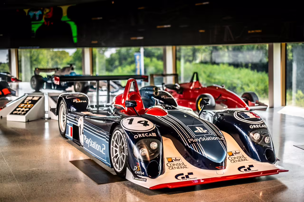 Explore iconic race cars at Dallara Academy, showcasing high-performance motorsport excellence in Parma.