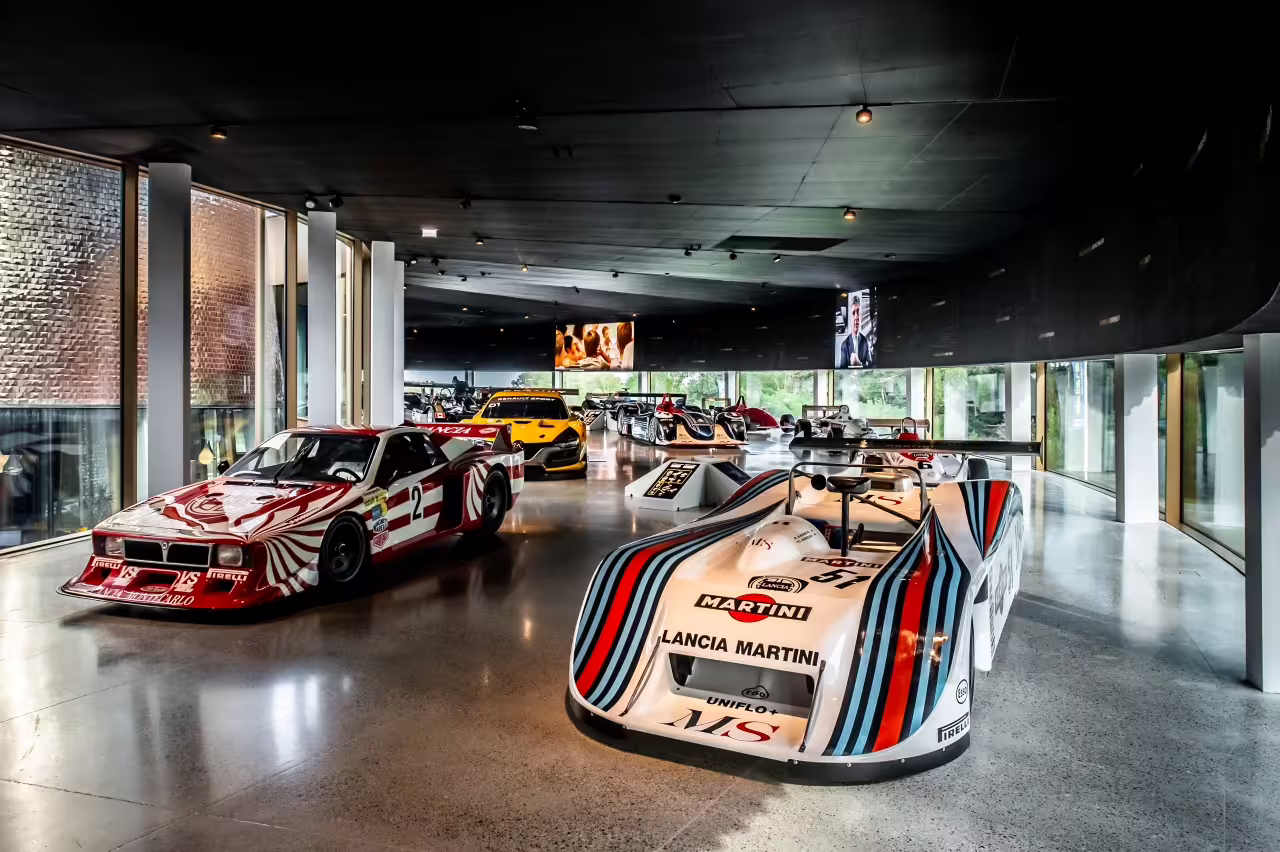 Experience the thrill of motorsport history with classic racing cars on display at Dallara Academy in Parma.