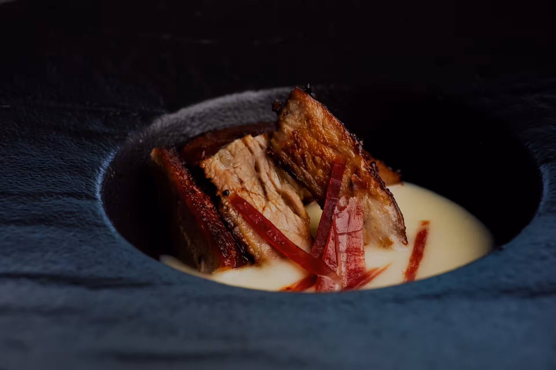 Slow-cooked Dalmatian pork with creamy sauce, a signature bite on The Taste of Dalmatia Split Wine & Dine
