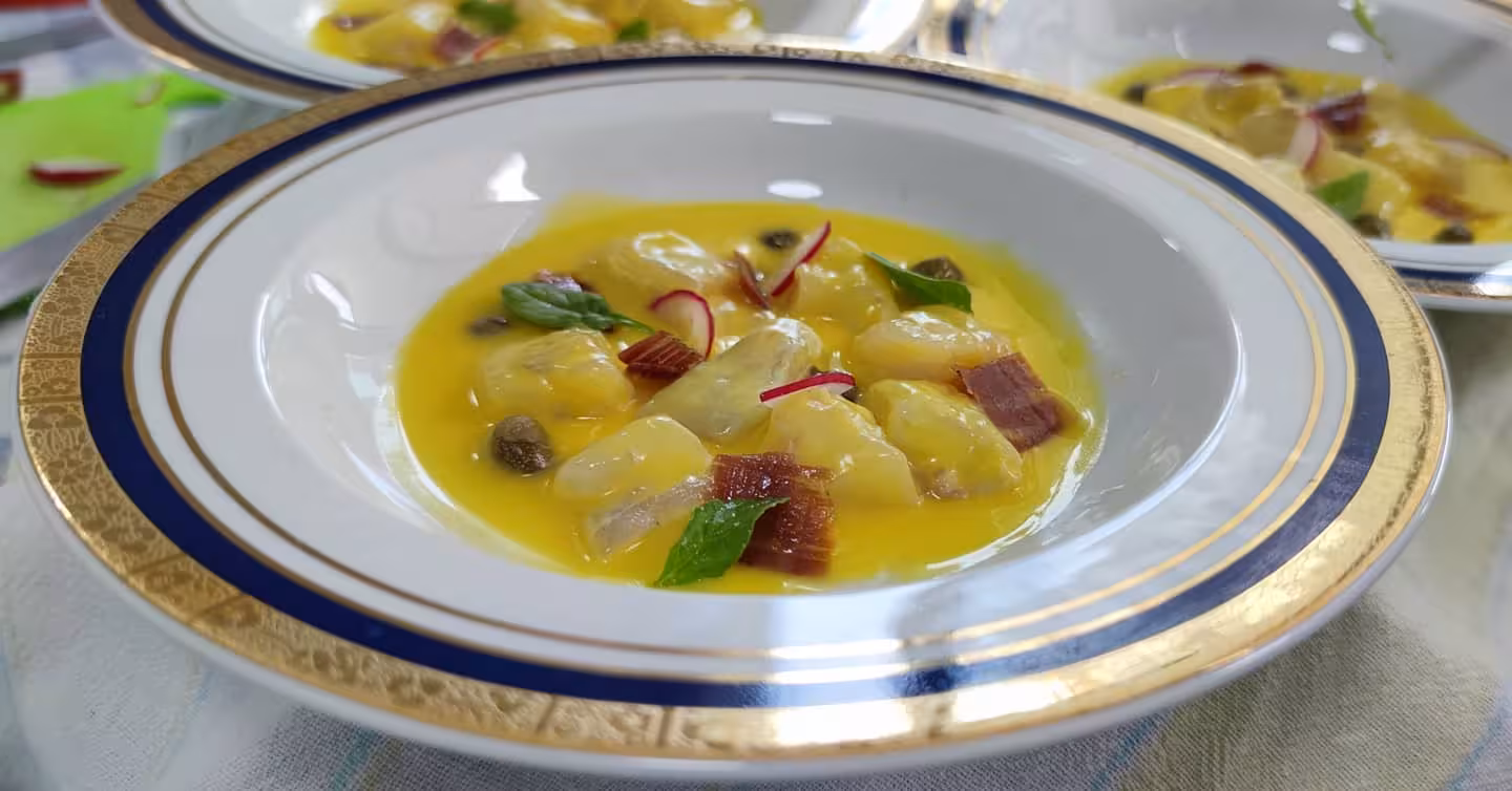 Dalmatian seafood dish in olive oil with capers and herbs, served on Split Wine & Dine tasting tour