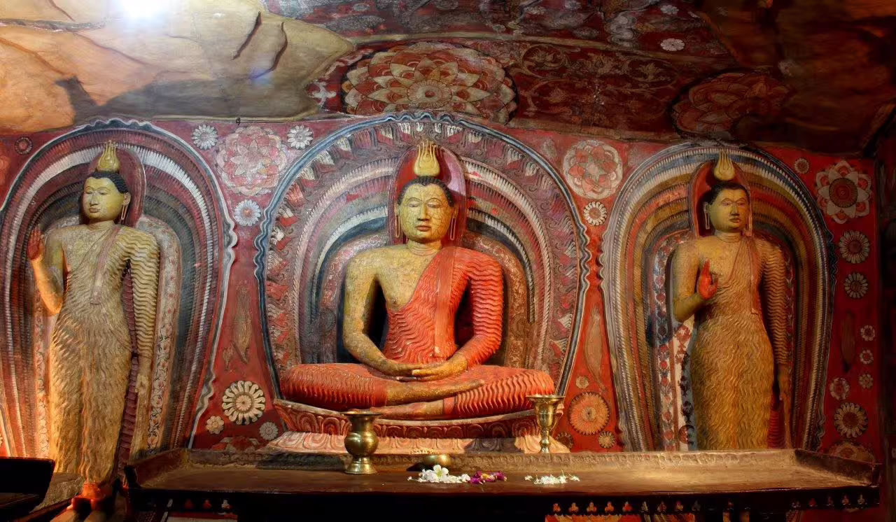 Marvel at the intricate Buddha statues and vibrant frescoes inside Dambulla Cave Temple on this private tour.