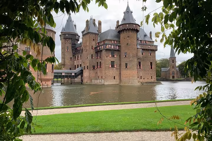 De Haar Castle Utrecht reflected in the moat, highlight of a private day tour from The Hague to De Haar