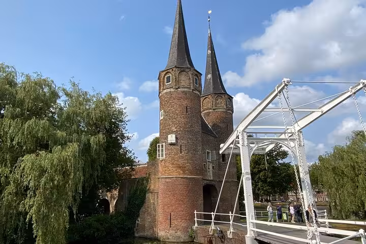 Delft Oostpoort gate and drawbridge stop on a private tour from Amsterdam to Kinderdijk and The Hague