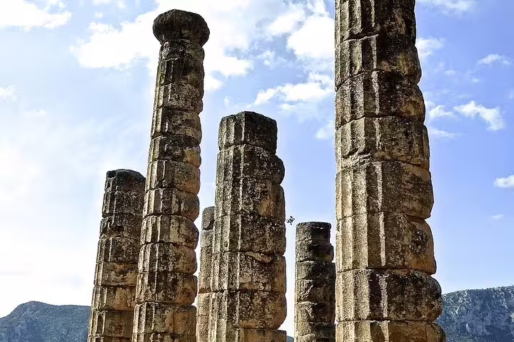Marvel at the towering ancient columns of Delphi under a bright blue sky on our private Athens tour.