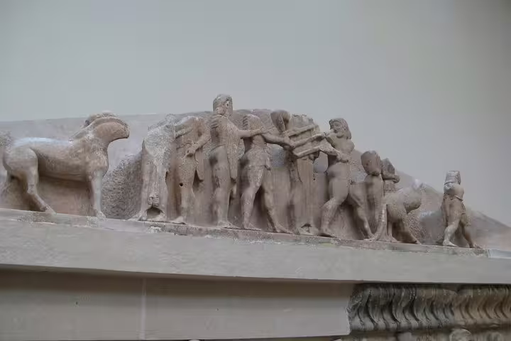 Ancient Greek temple frieze relief at Delphi Archaeological Museum, included in Delphi full day tour