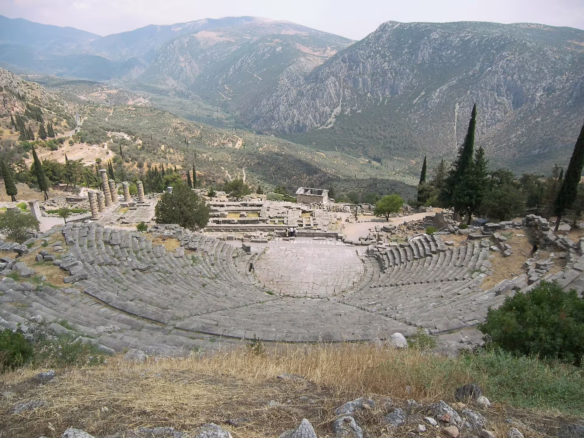 Delphi ancient theater overlooking the valley, highlight of a private Delphi and Thermopylae tour from Athens