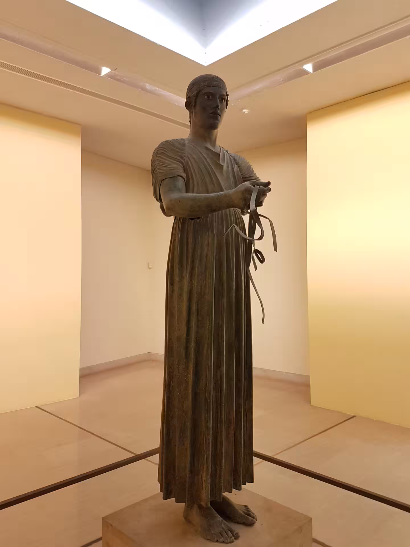 Ancient Delphi Museum statue of the Charioteer, must-see stop on a private Delphi and Thermopylae tour