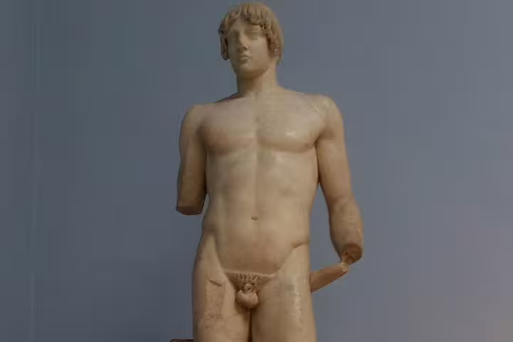 Ancient Greek marble statue at Delphi Archaeological Museum, highlight stop on Thermopylae Meteora Delphi tour