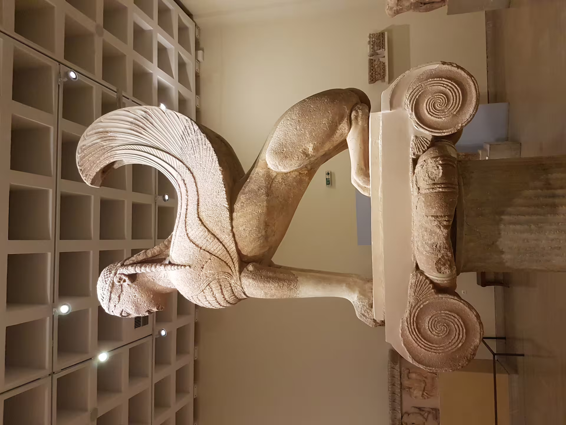 Ancient Delphi museum marble sphinx sculpture on display, private Delphi tour from Athens with guide