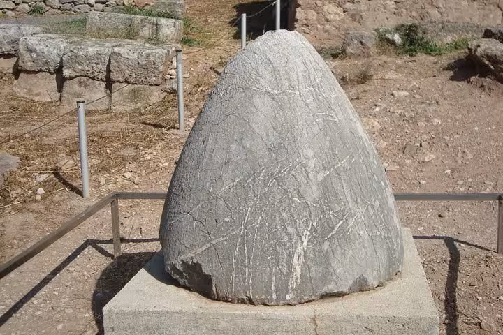 Sacred Omphalos stone at Delphi Archaeological Site on a luxury private tour from Athens to Meteora