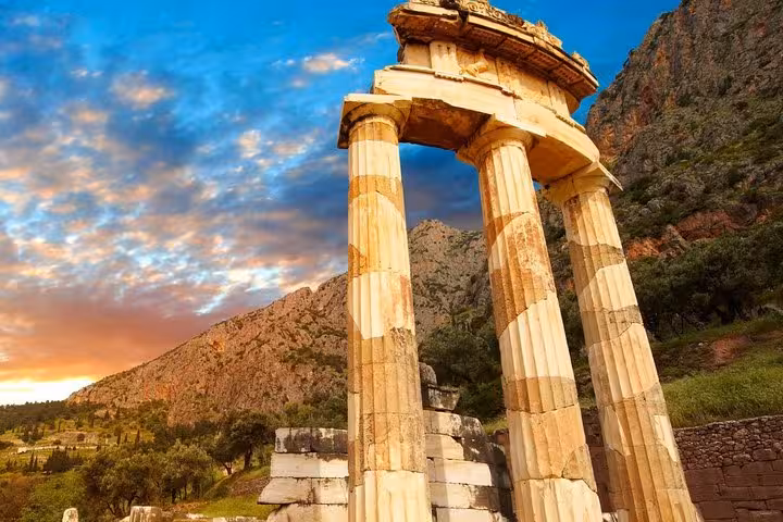 Delphi Temple columns at sunset in Greece, scenic stop on Mystical Delphi luxury day tour and Hosios Loukas visit