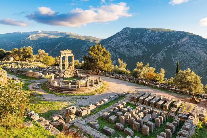 Delphi archaeological site and Tholos of Athena Pronaia on private Athens day tour with dinner