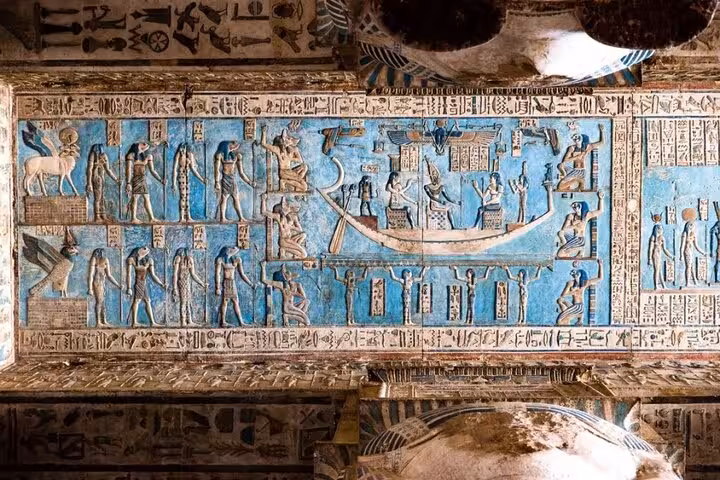 Colorful Dendera Temple ceiling reliefs and hieroglyphs, highlight of Dendera and Abydos day tour from Luxor